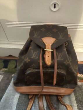 Louis Vuitton Monogram Mini Backpack with Tan Leather Trim
Lovingly used!